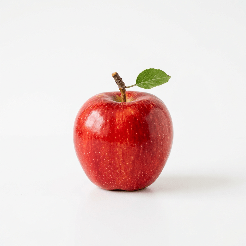 Shiny red apple with green leaf on stem